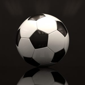 26273296-realistic-soccer-ball-on-dark-background